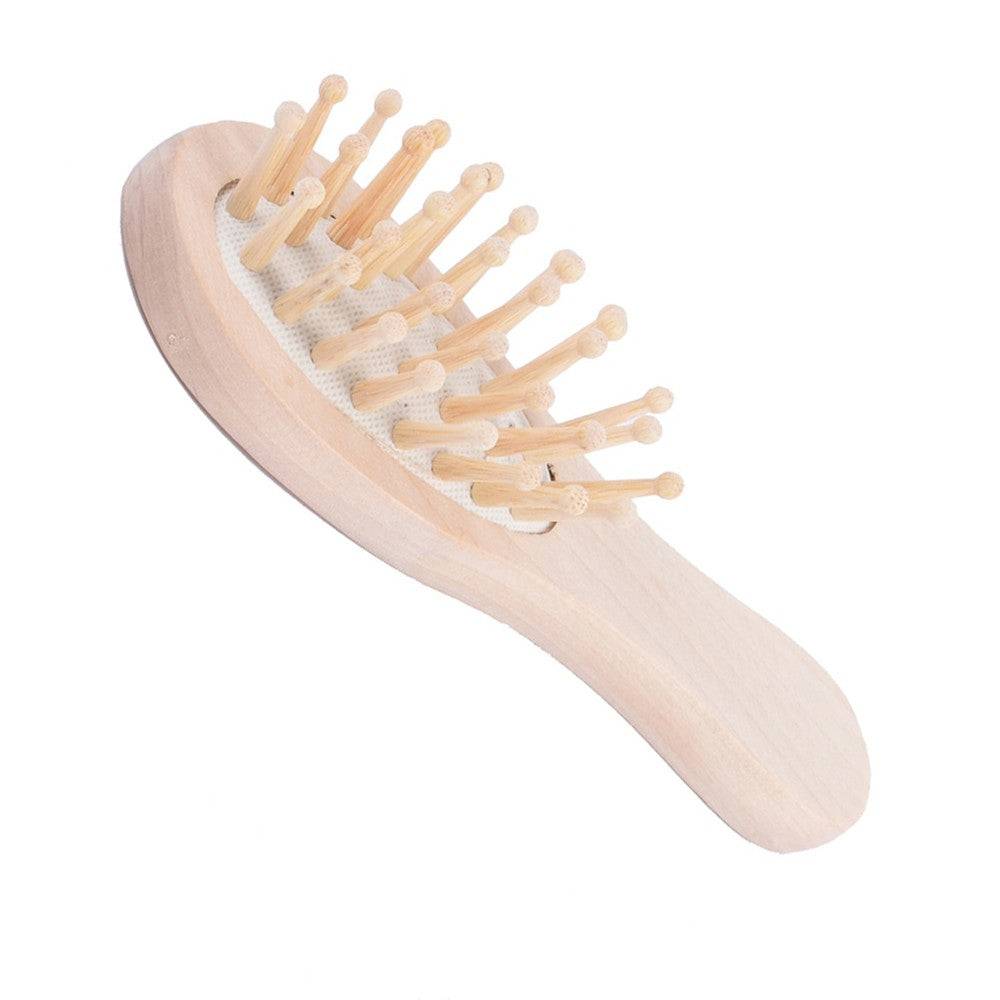 Perie de păr din lemn mică