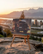 Tablou canvas personalizat cu camion de pompieri expus pe È™evalet Ã®n aer liber, cu peisaj urban la apus. Perfect pentru decor interior cu stil unic.
